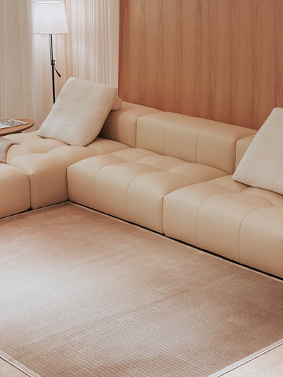 L-shaped modular sofa with ottoman in Singapore showroom