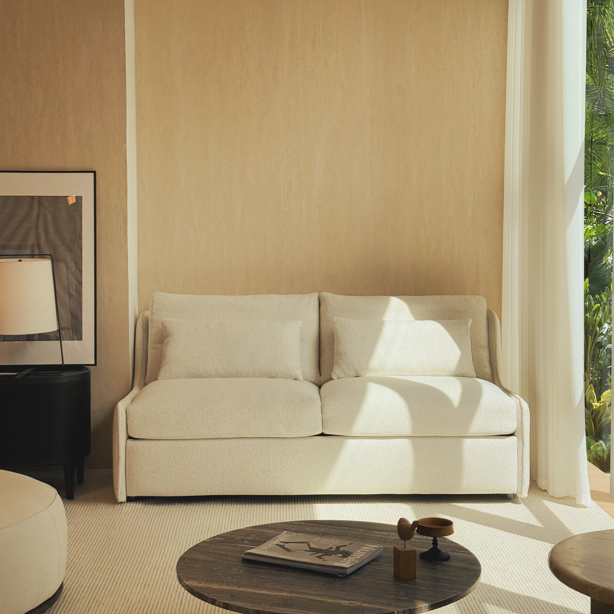 Beige sofa in a modern living room with a neutral color palette