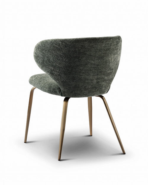 Modern chair with green upholstered seat and backrest on a white background