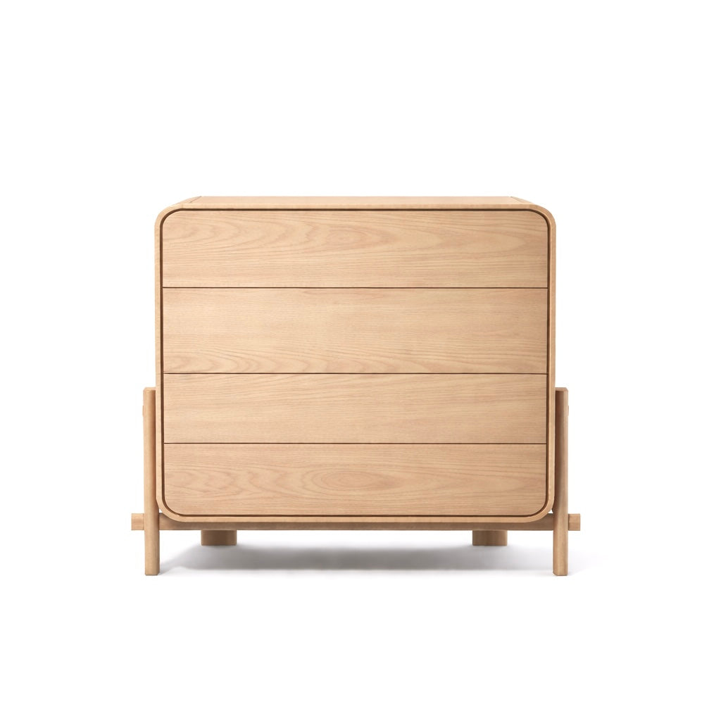 Wooden bed frame with drawers on a white background